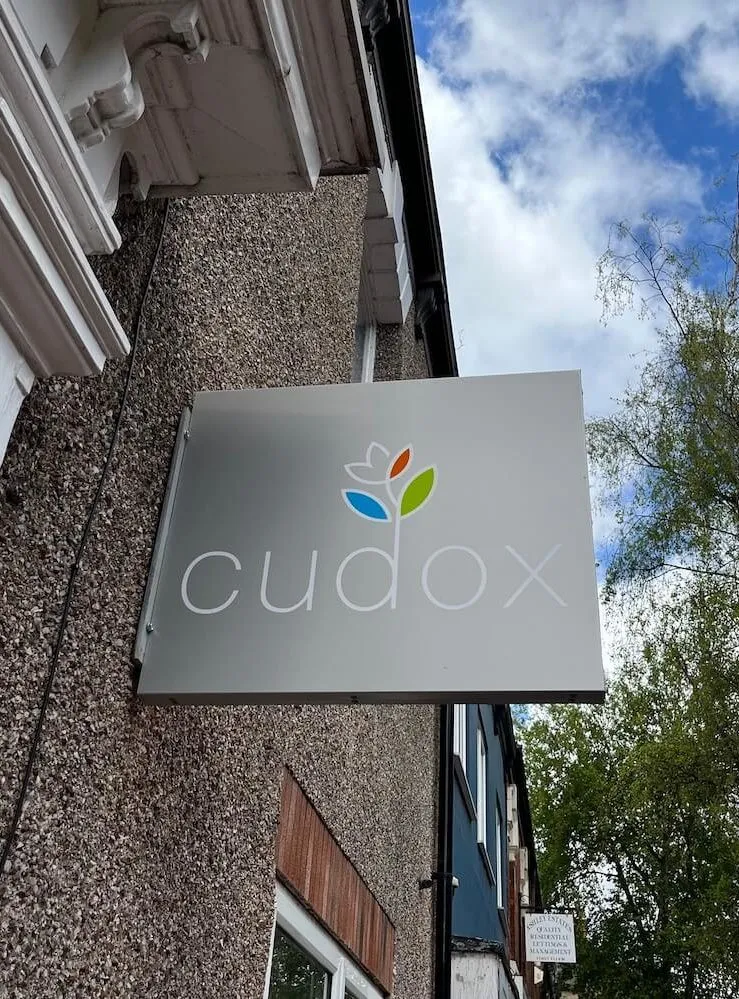 Cudox exterior showing their sign and branding