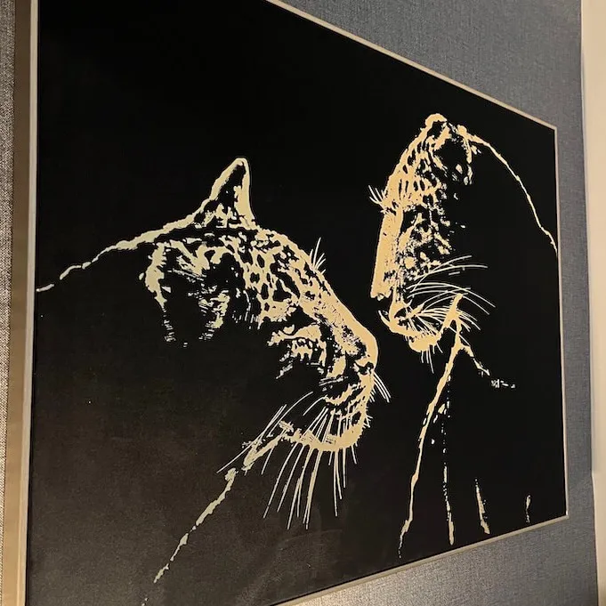 Two leopards on a painting in the Cudox office