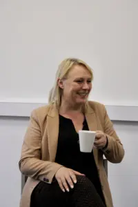 Bev Herron drinking coffee