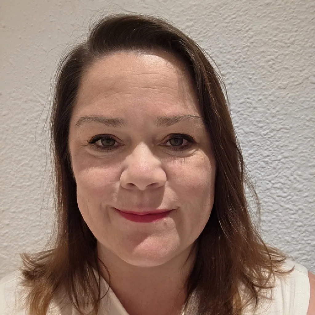A photo of Cudox's Mandy Turner smiling at the camera